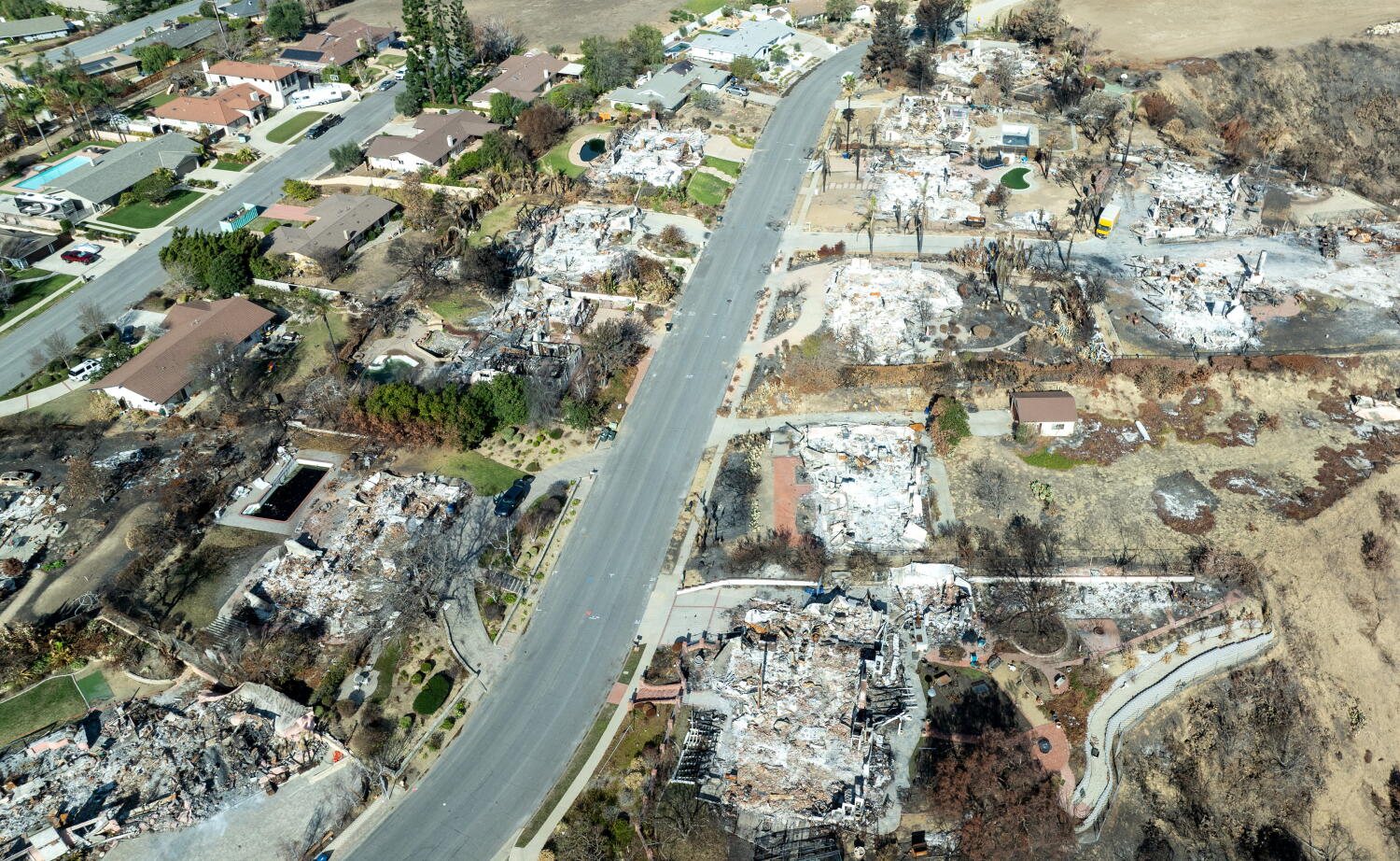 Camarillo, CA - December 16: Burned homes on Old Coach Drive in the aftermath of the Mountain fire, sparked the morning of Wednesday, Nov. 6, and exploded to more than 20,000 acres within two days, fueled by powerful Santa Ana winds and extremely low humidity. Photographed on Monday, Dec. 16, 2024 in Camarillo, CA. (Brian van der Brug / Los Angeles Times)